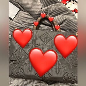 Black puffer style tote bag